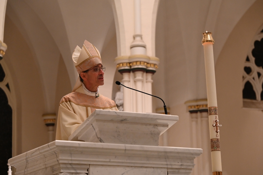 Bishop speaking at the ambo