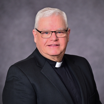 headshot of priest