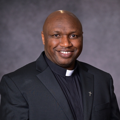 headshot of priest