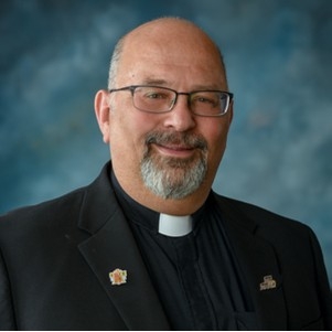 headshot of priest