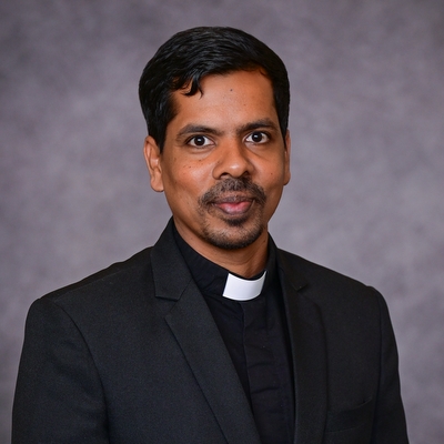 headshot of priest