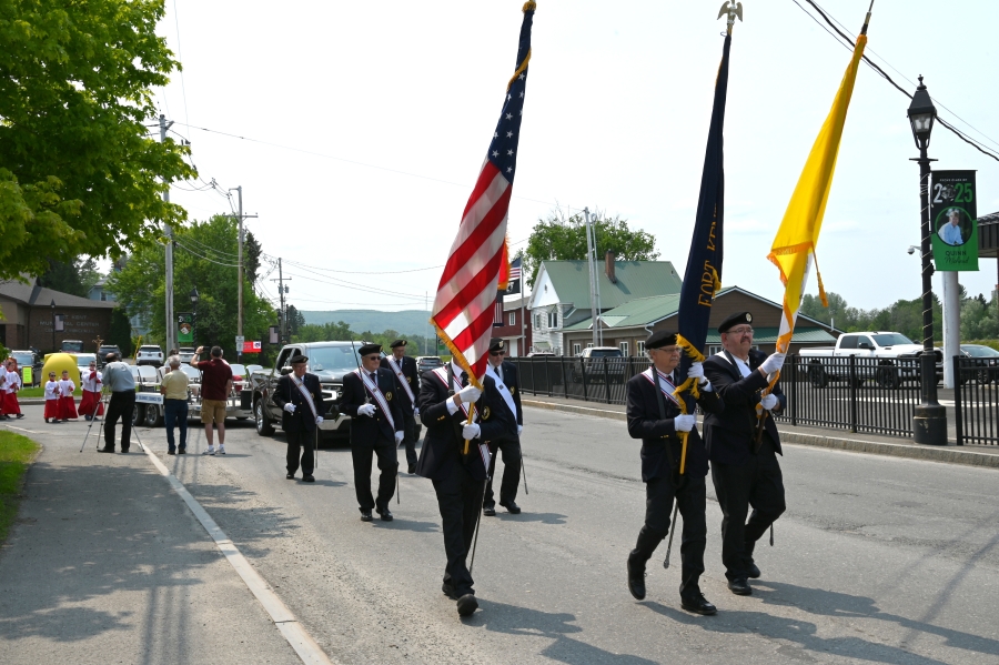 Knights of Columbus lead the procession.