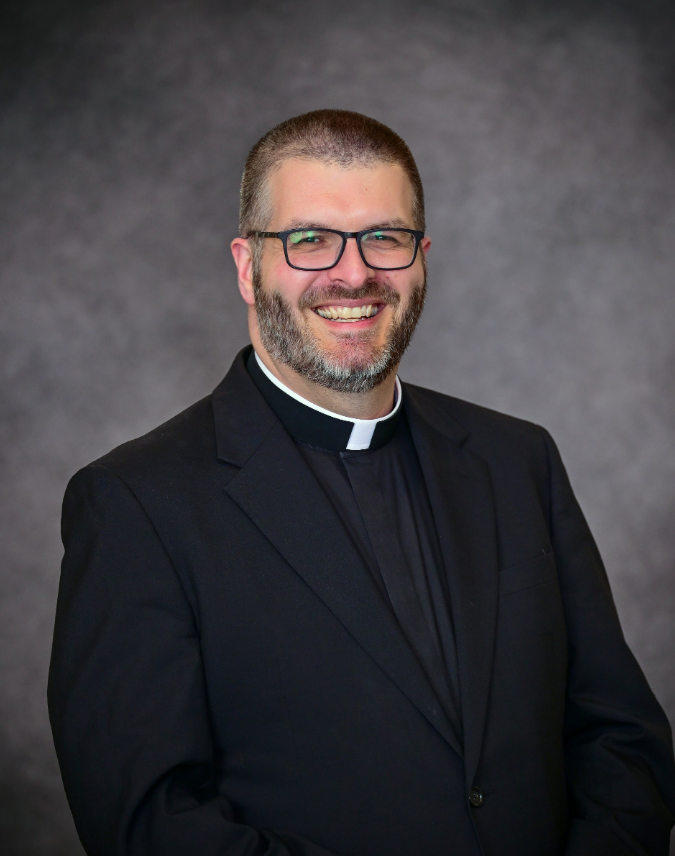 headshot of priest
