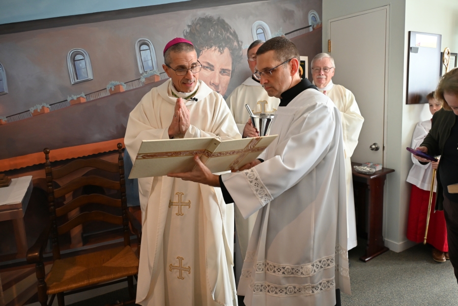Bishop James Ruggieri offers a prayer.