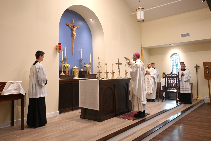 Bishop Ruggieri incenses the altar.