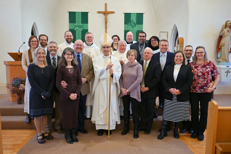 Bishop Ruggieri with the deacons, deacon candidates, and their wives