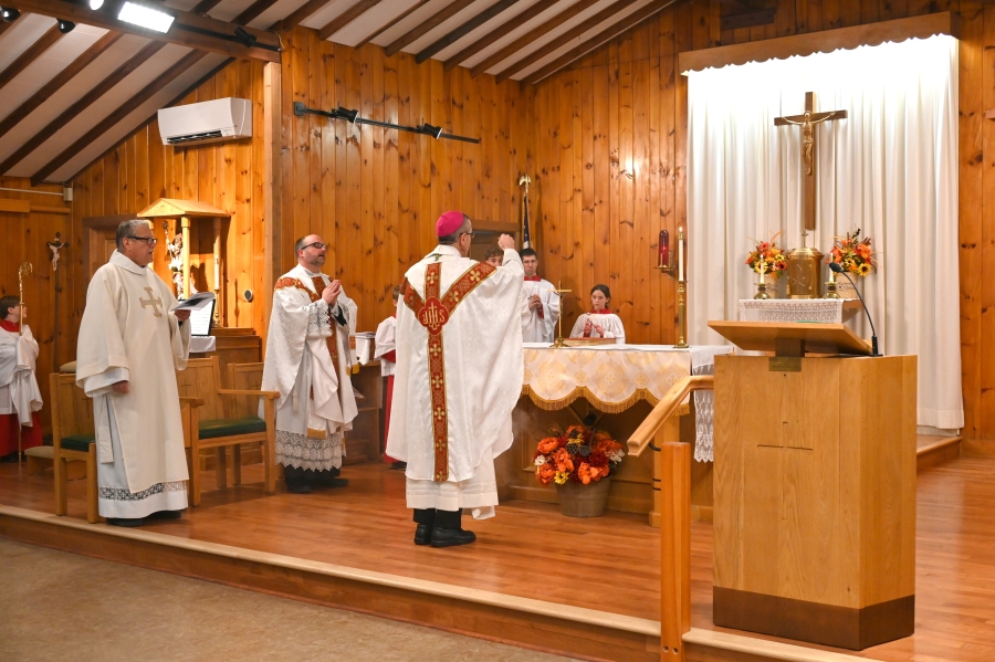 Bishop Ruggieri incenses the altar.