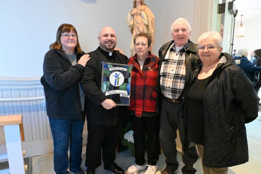 Janet Lepage, Father Brad Morin, Kathy Shorette, Duane Brasslett, and Sue Cust.