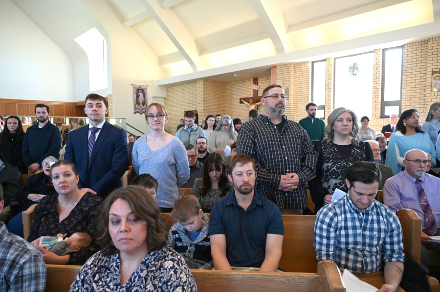 A group of candidates/catechumens stand at St. John the Baptist Church in Winslow.