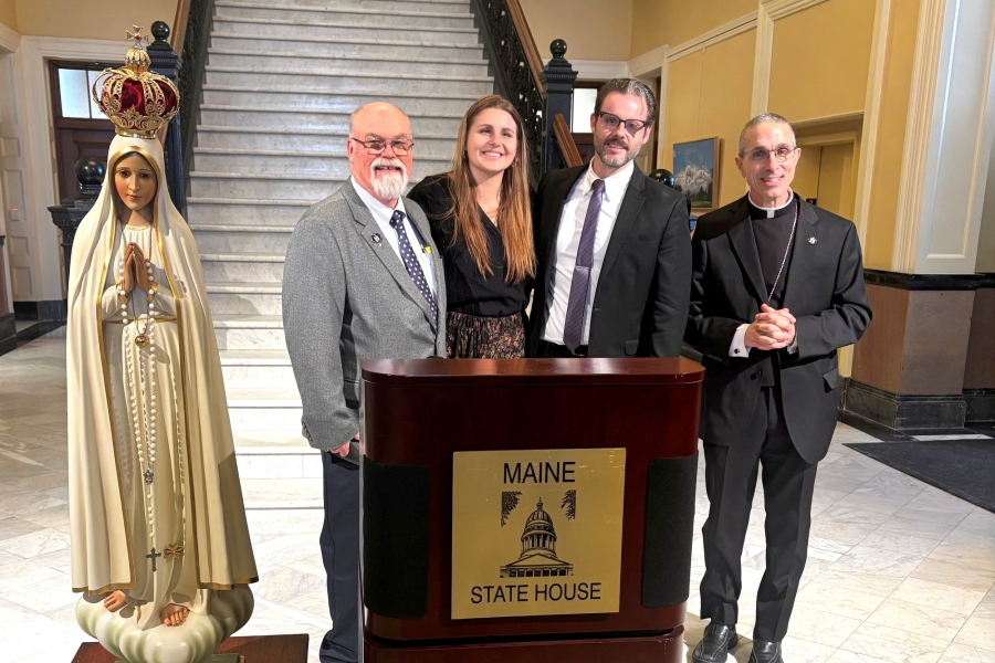 Rep. Ducharme, Jenna and Aaron Kregnow, and Bishop James Ruggieri