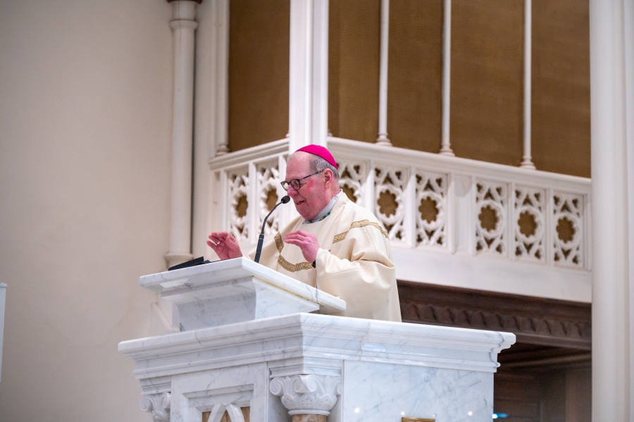 Bishop Emeritus Deeley giving the homily