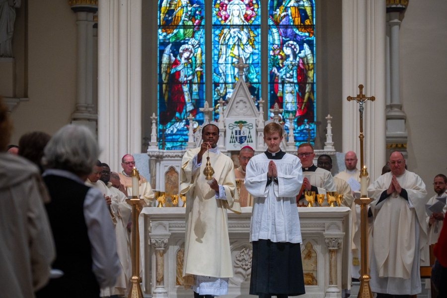 seminarians in front of altar