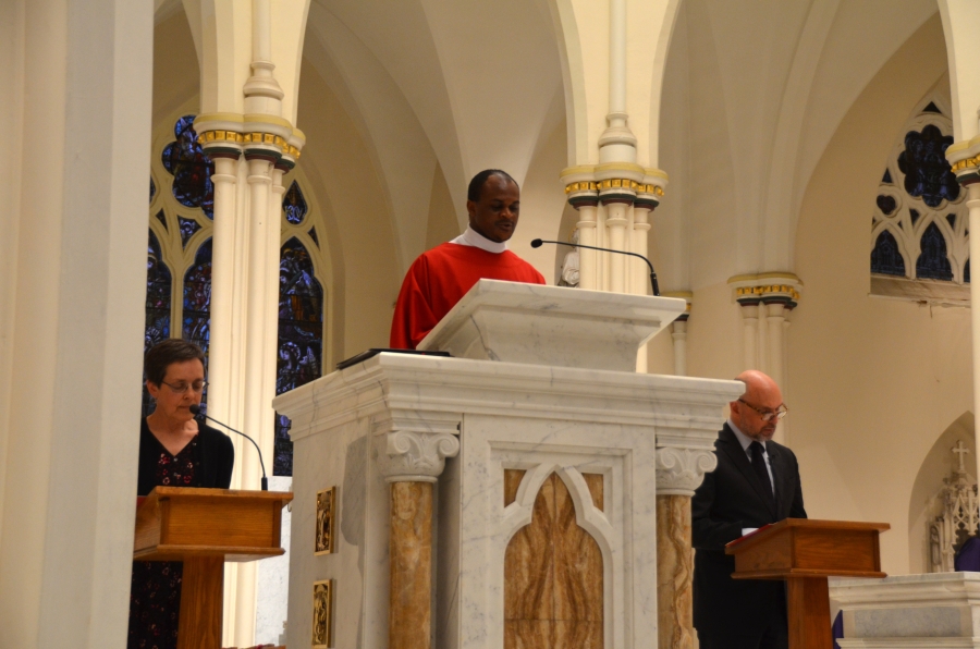 Deacon speaking at the ambo