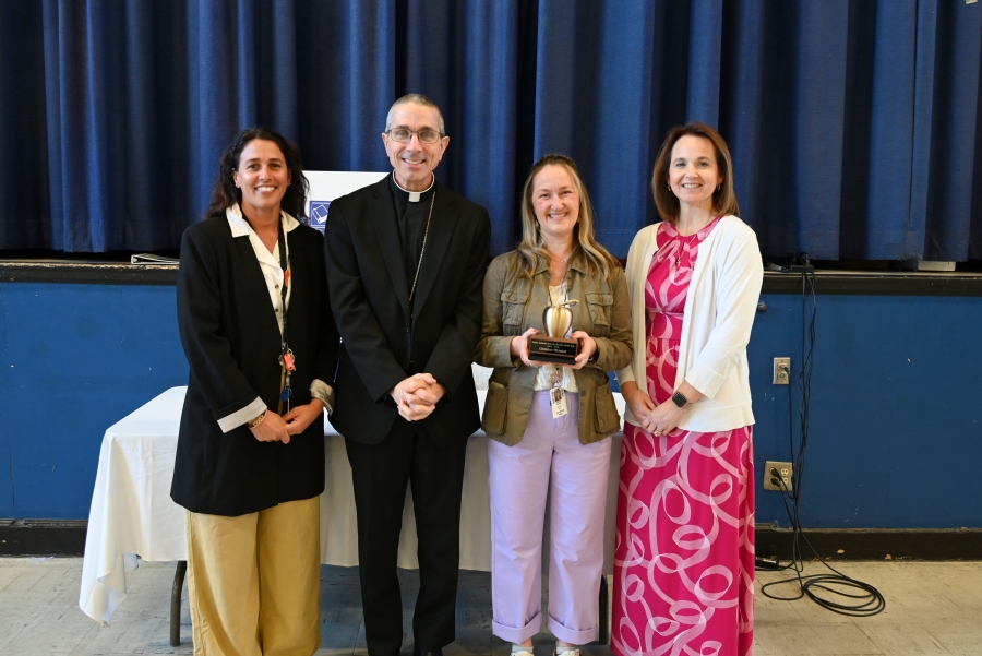 Alanna Stevenson, Bishop James Ruggieri, Christine Michaud, and Shelly Wheeler