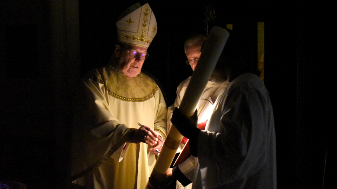 Preparing the paschal candle