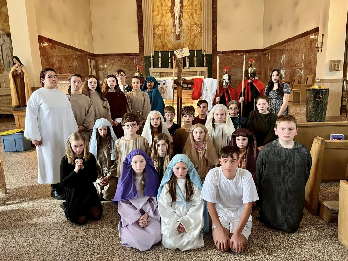 Students presented the Living Stations of the Cross on Good Friday.