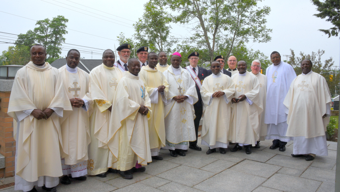 Bishop George Nkuo and the priests from the Diocese of Kumbo