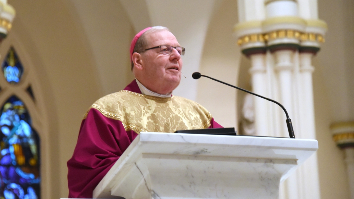 Bishop Robert Deeley delivering a homily.