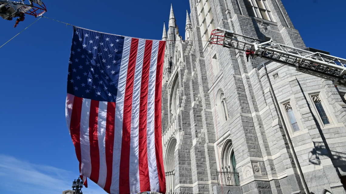 American flag hanging outside the basilica 