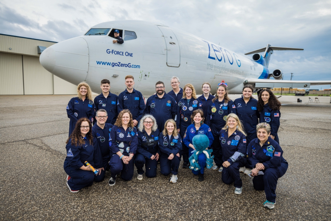 Pictured in front of G-Force One are the 8 teachers in the Embedded Teacher Program, with Space for Teachers mentors, NASA STEM Enhancement in Earth Science (SEES) interns, Zero-G pilot, Marcos Valdez, and Astronaut Cady Coleman