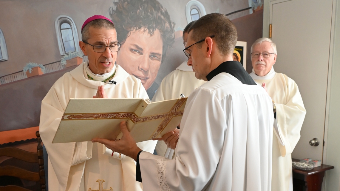 Bishop Ruggieri offers a prayer during the chapel blessing.