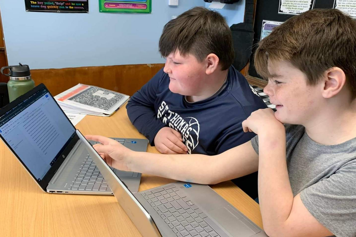 Two boys at a computer