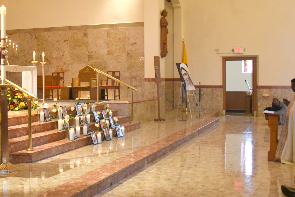 Father Raja Thaniyel before the Blessed Sacrament