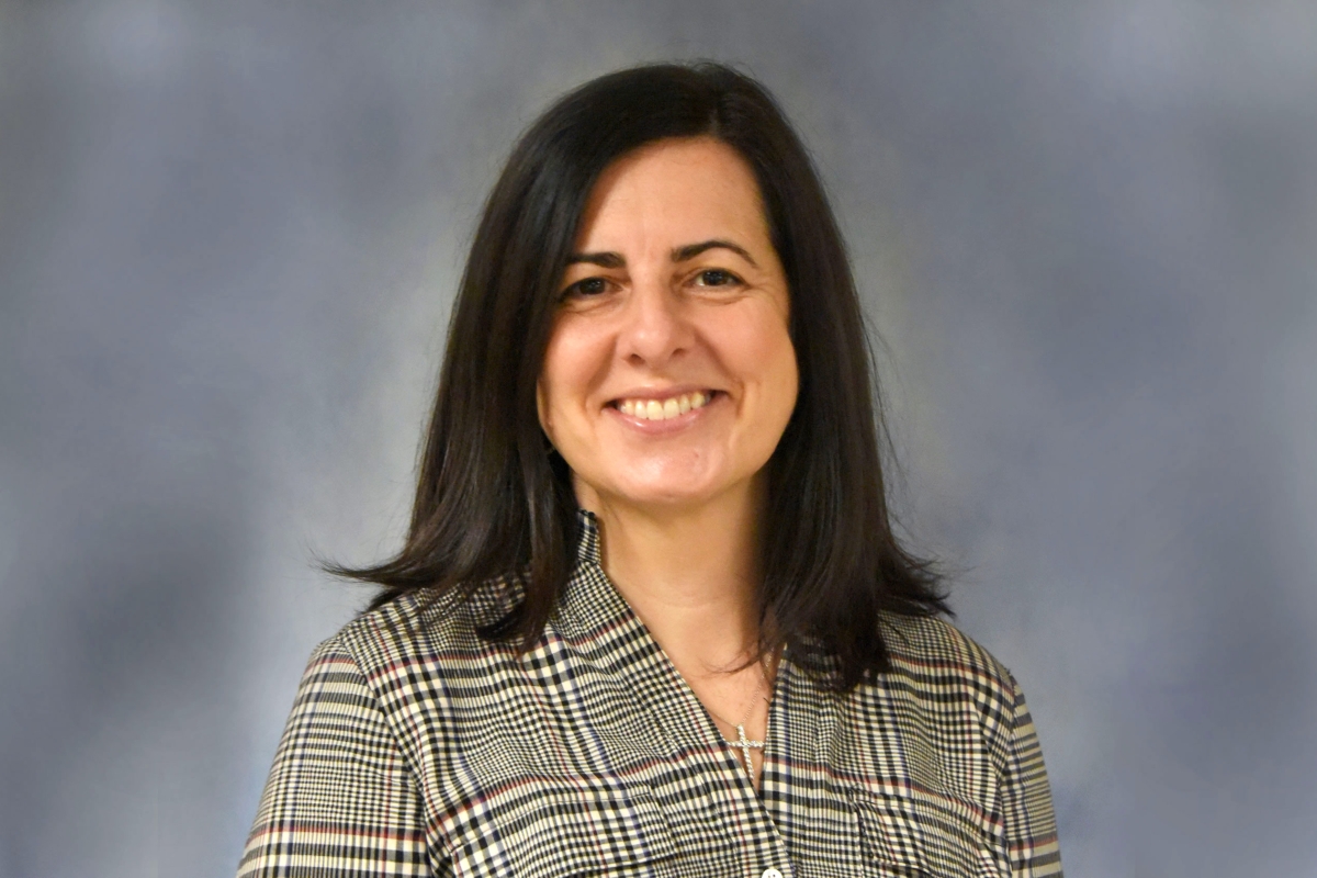 Headshot of woman with dark hair