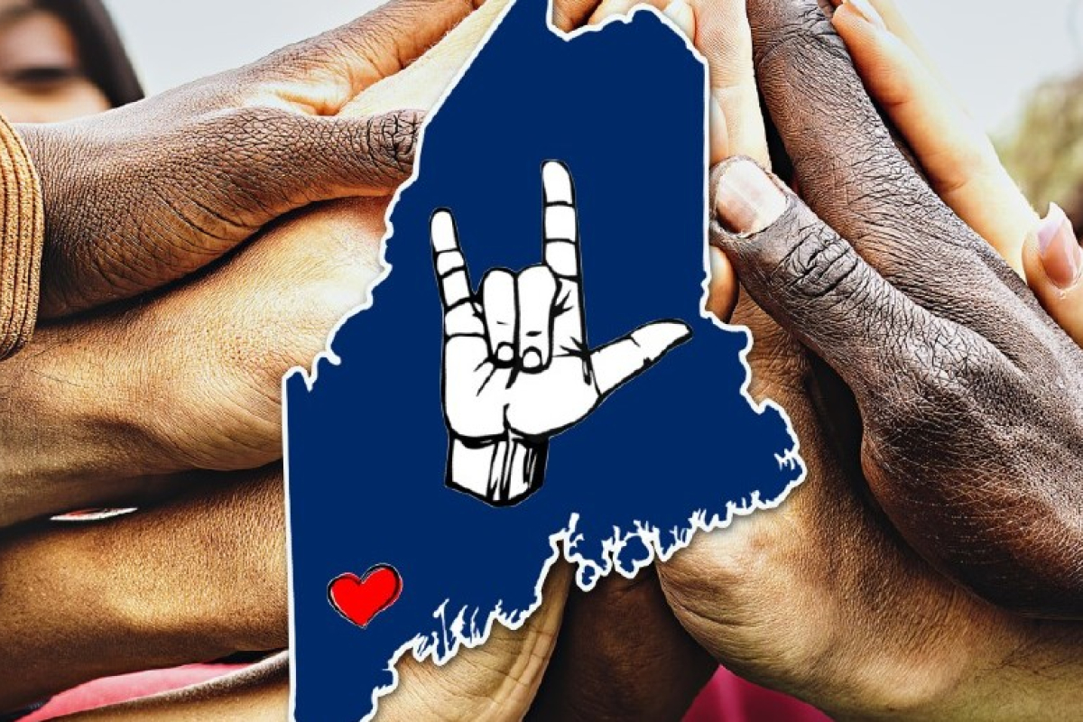 State of Maine with hands behind it