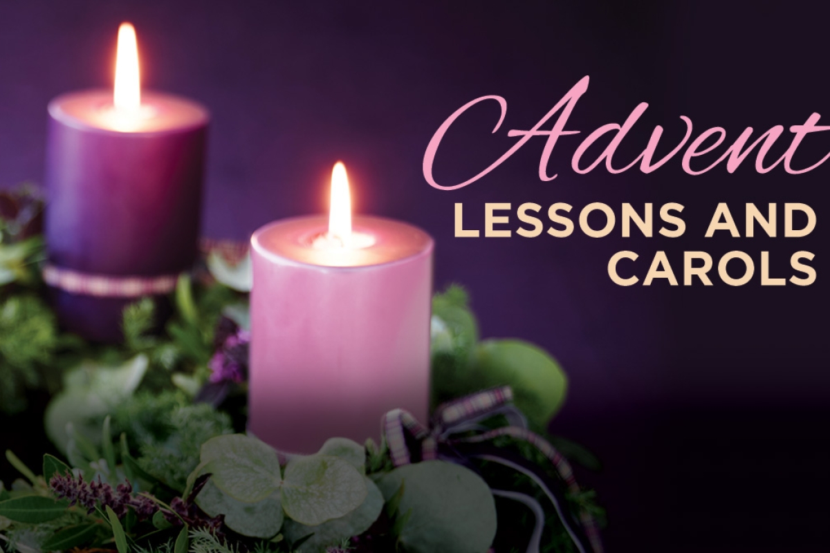 Candles with evergreen and the words Advent Lessons and Carols.