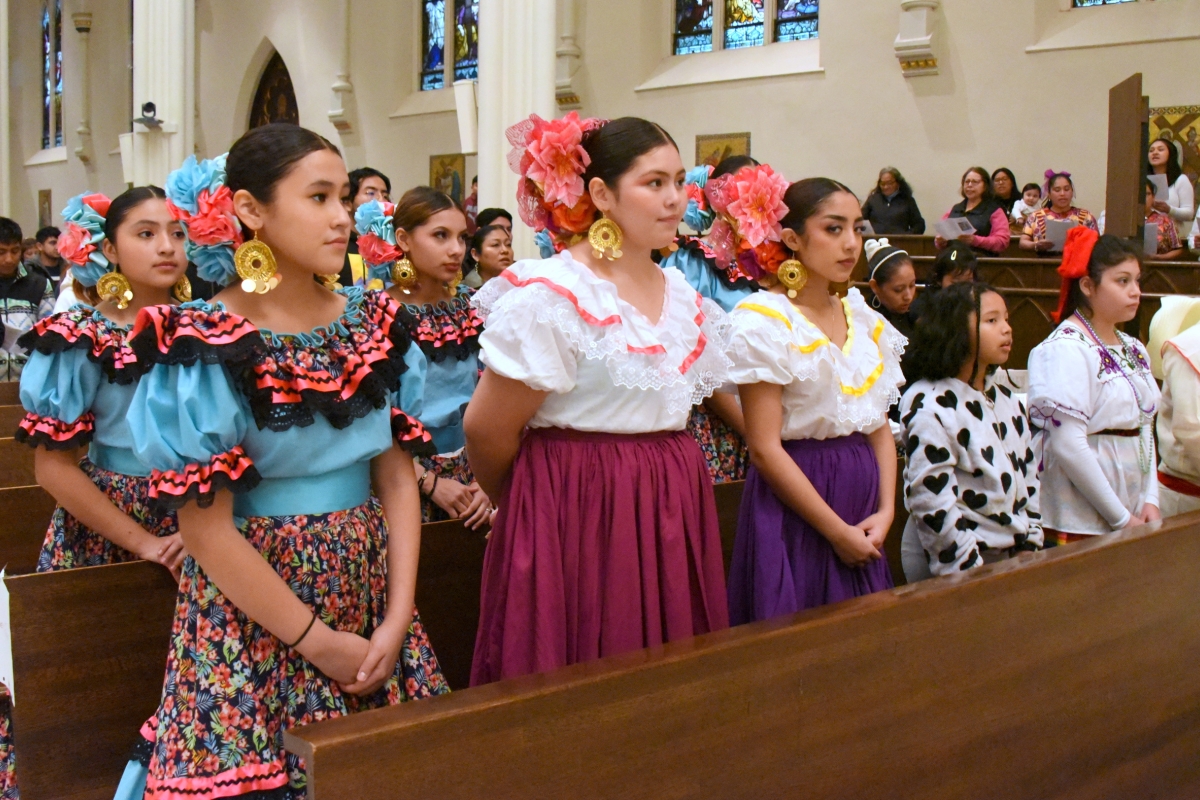 Women in colorful dresses.