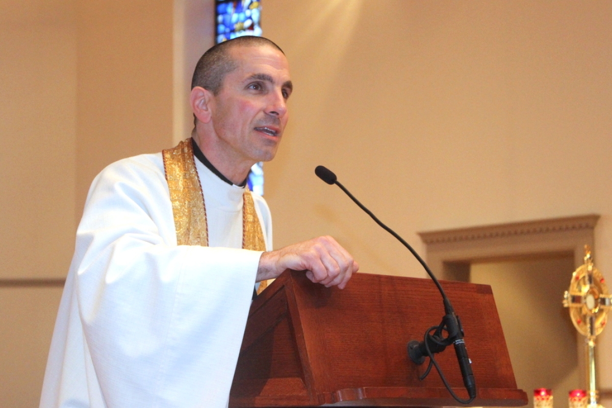 priest speaking