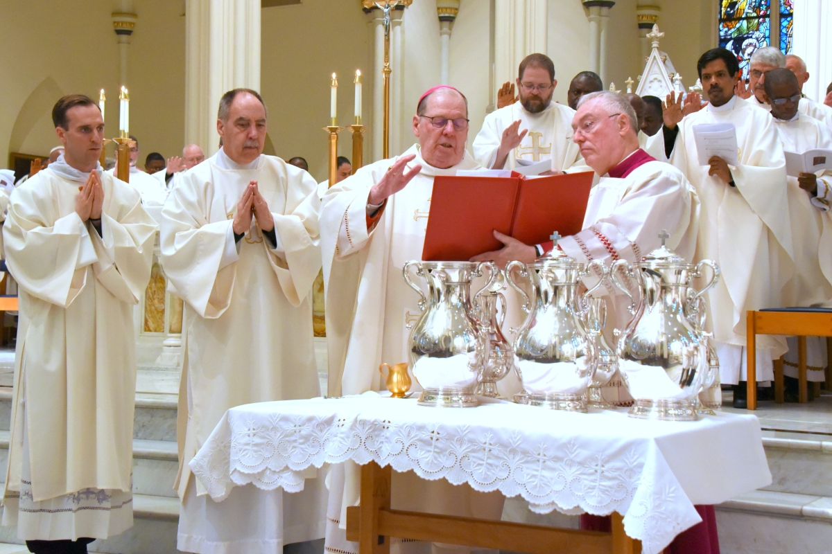 Bishop Deeley consecrates the oil of the chrism.