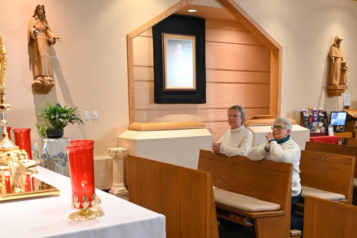 Doris Belanger and Regina Scanlon in the River Adoration Chapel in Lewiston.