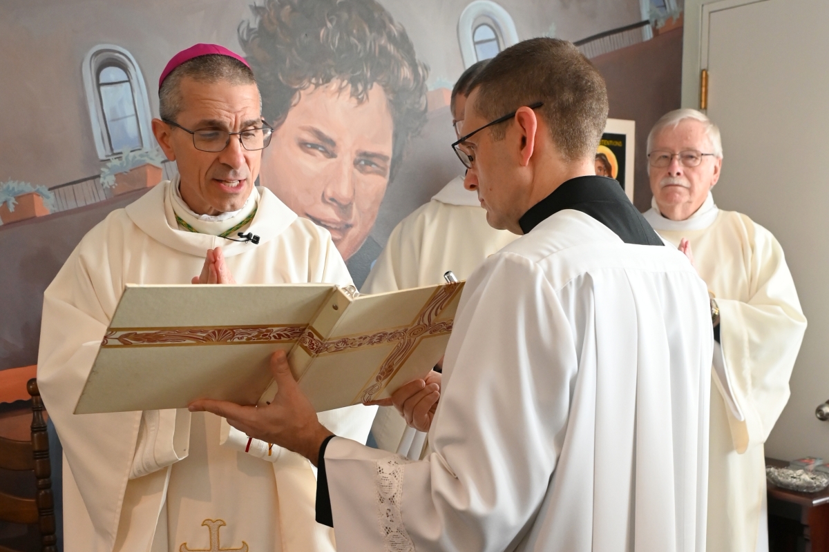 Bishop Ruggieri offers a prayer during the chapel blessing.